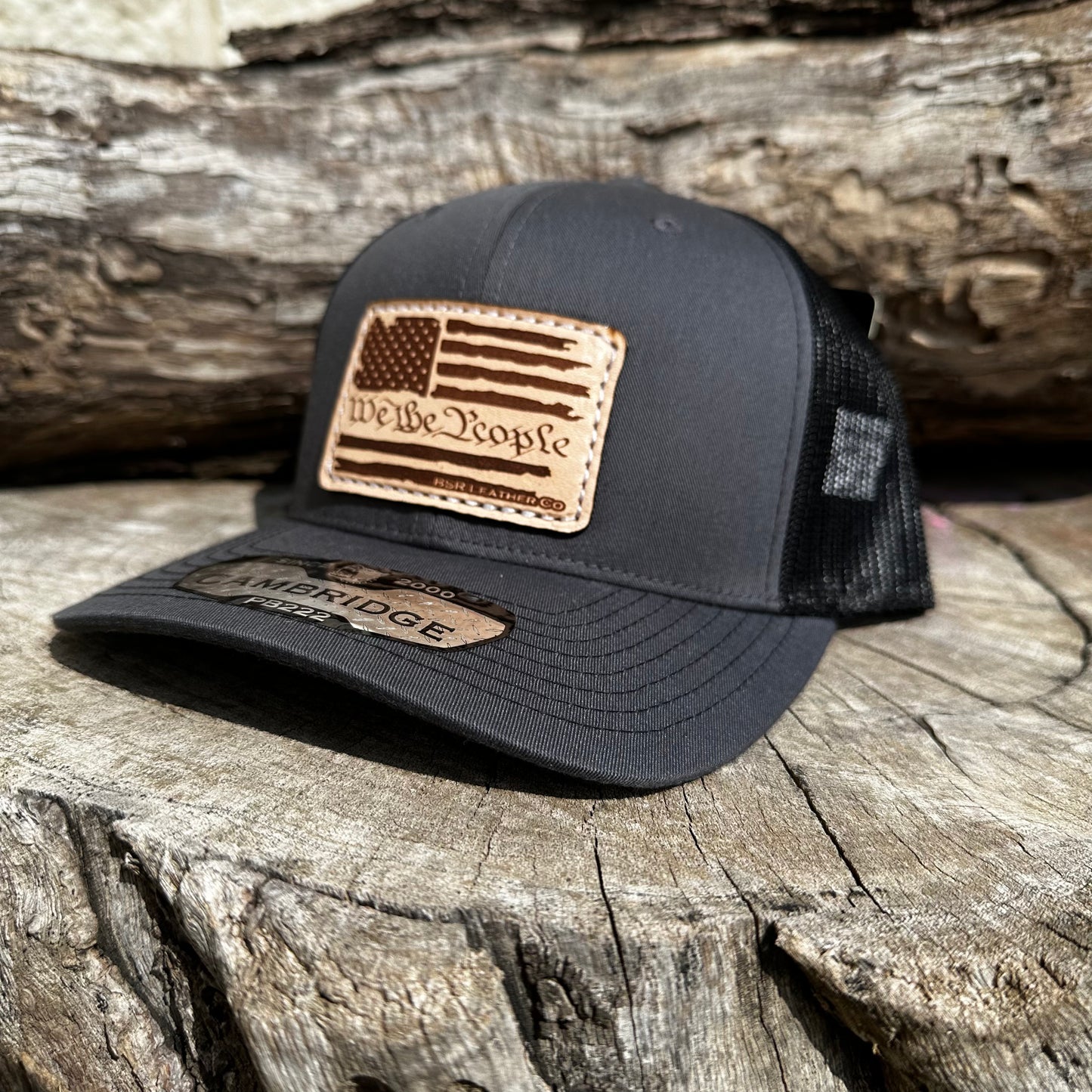 We the People Trucker Cap- Charcoal/ Black